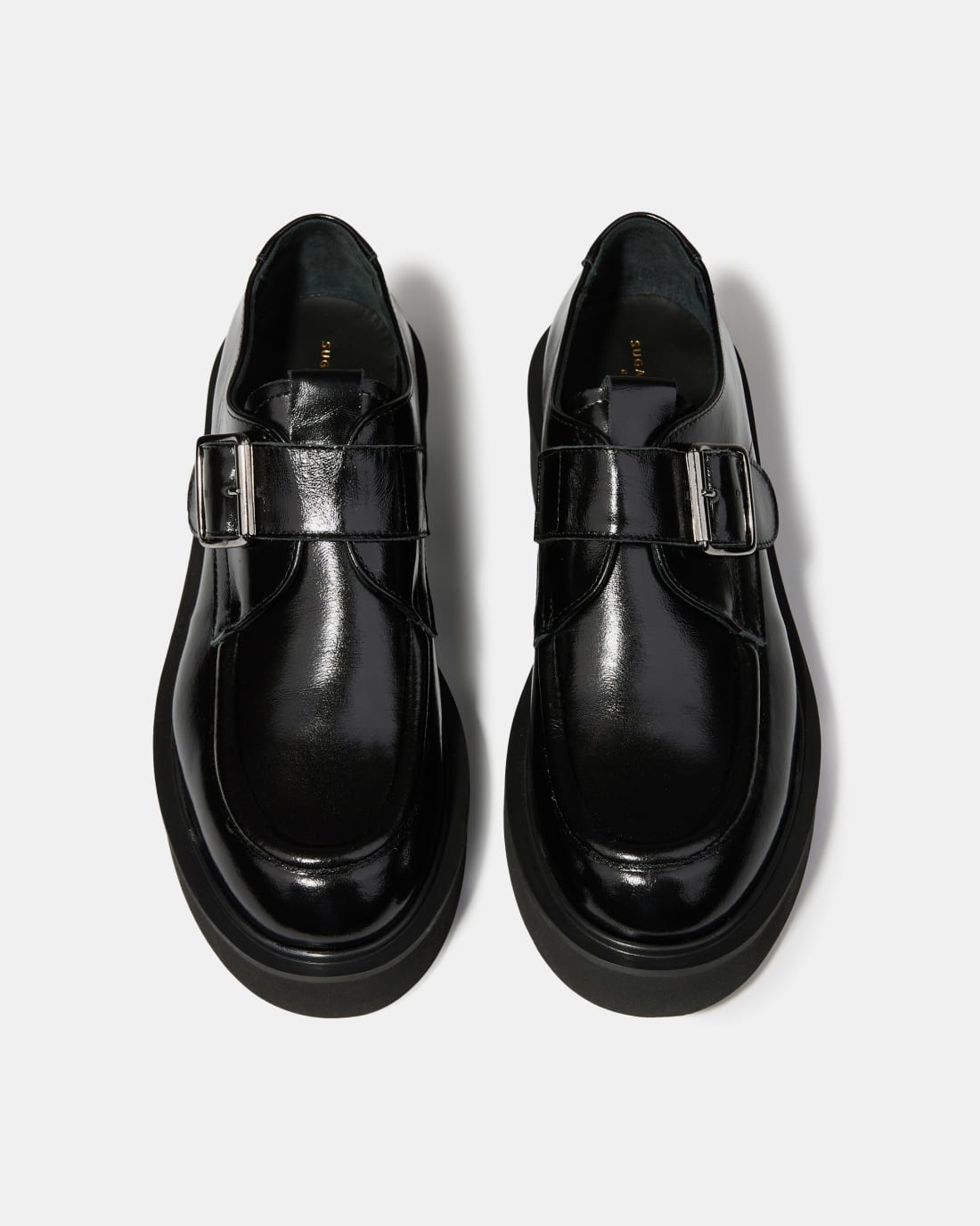 Черные кожаные лоферы на платформе