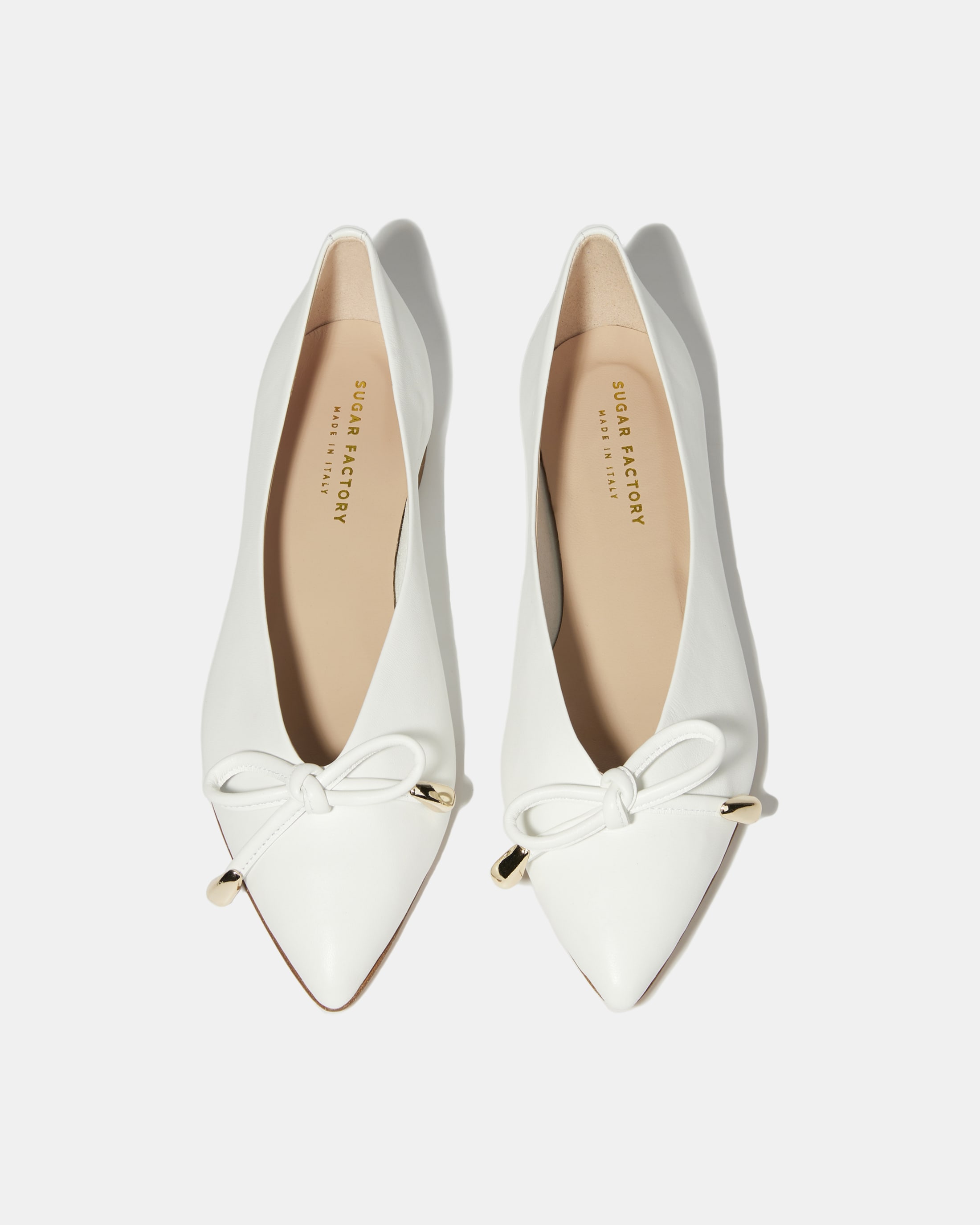 Белые балетки из натуральной кожи 