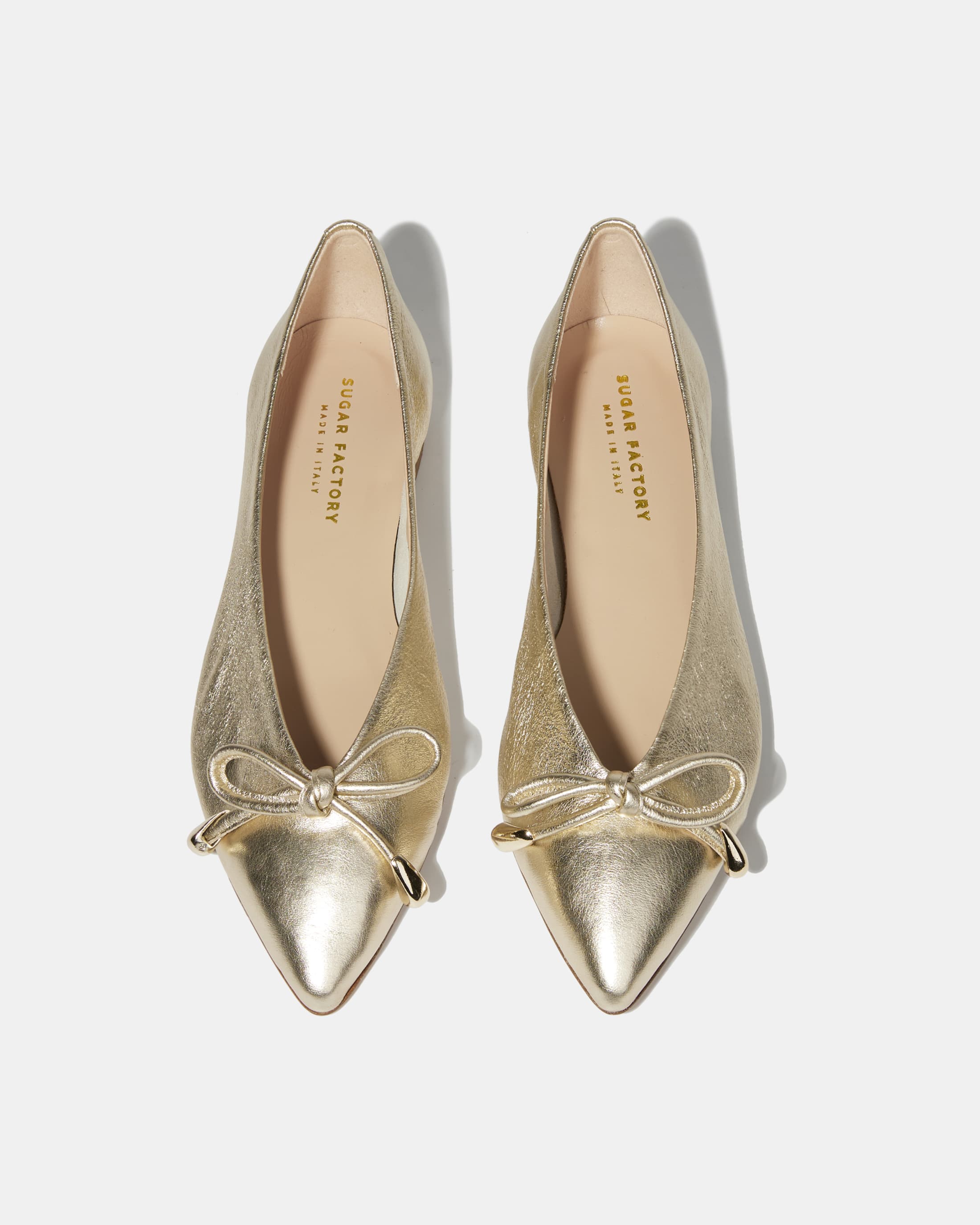 Золотые балетки из натуральной кожи 