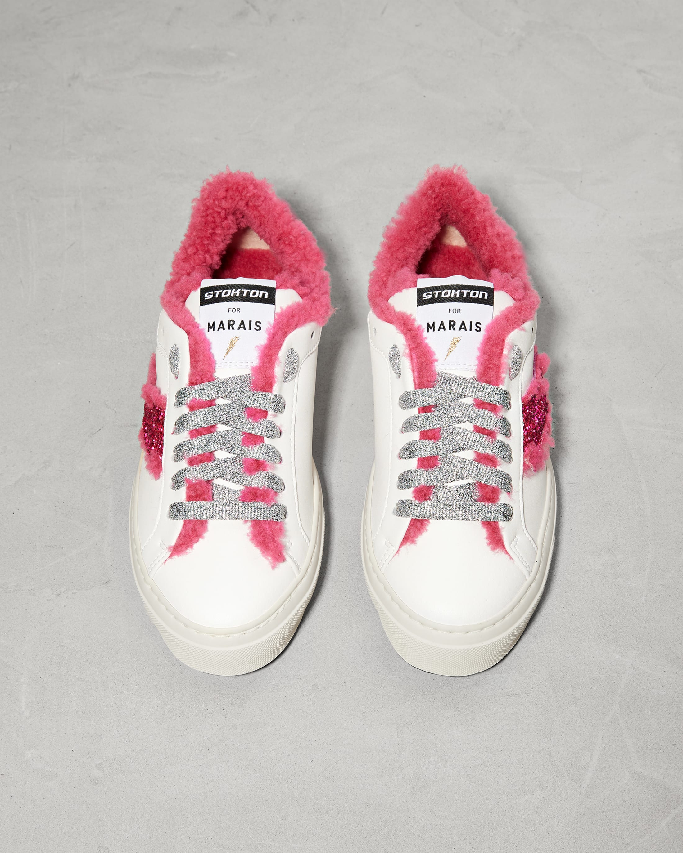 Белые кеды из натуральной кожи с розовым мехом