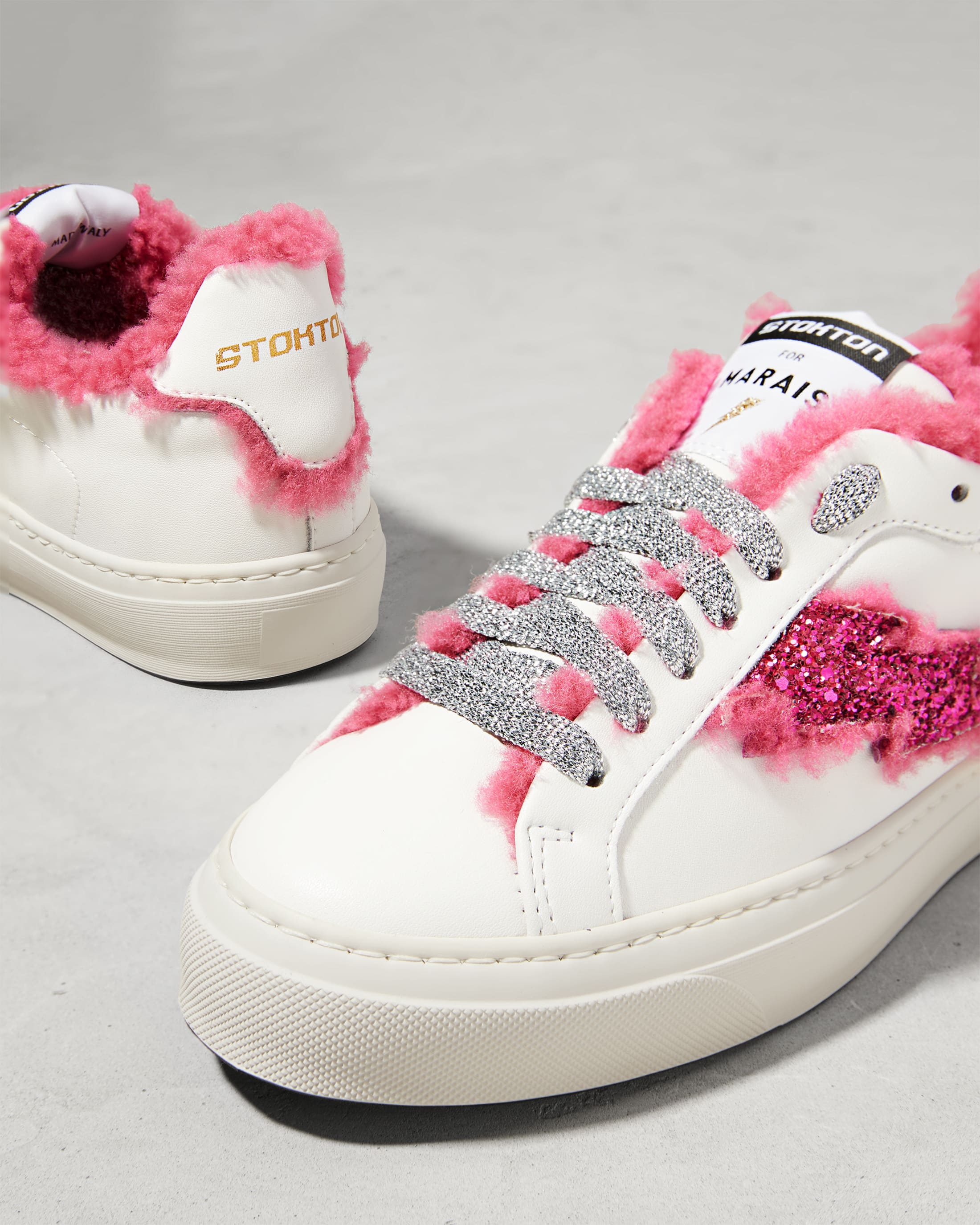 Белые кеды из натуральной кожи с розовым мехом